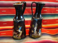 Mexican vintage pottery and folk art, a pair of blackware pouring vessels from Tlaquepaque, Jalisco, c. 1930-40. The vessels are decorated with very inticate scenes. Main photo.