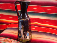 Mexican vintage pottery and folk art, a pair of blackware pouring vessels from Tlaquepaque, Jalisco, c. 1930-40. The vessels are decorated with very inticate scenes. Photo of the second pouring vessel.