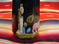 Mexican vintage pottery and folk art, a pair of blackware pouring vessels from Tlaquepaque, Jalisco, c. 1930-40. The vessels are decorated with very inticate scenes. Another photo of the designs.
