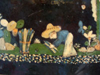 Mexican vintage pottery and folk art, a blackware tile with a beautiful scene of a campesino gathering and bundling wood, Tlaquepaque, Jalisco, c. 1930's. Closeup photo of campesino gathering wood.