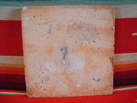 Mexican vintage pottery and folk art, a tile with terra cotta colored field and with a scene of a burro and doggie, Tonala, Jalisco, c. 1940's. Photo of the back side of the tile.