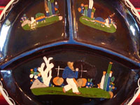 Mexican vintage pottery and folk art, a blackware plate with a great scene of a campesino carrying water and two endearing armadillos, Tlaquepaque, Jalisco, c. 1930's. This plate resembles the blackware plate above (CC-14) and is probably by the same artist.  Closeup photo of front of plate.