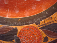 Mexican vintage pottery and ceramics, a beautiful burnished charger with very intricate decoration, by famous Master Artist of Mexican Folkart Pottery, Salvador Vasquez, Tonala, c. 1960. Closeup photo of the artist's signature on the front of the charger.