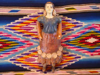 Mexican vintage pottery and ceramics and Mexican vintage folk-art, a wonderful bank in the form of a lovely Mexican woman, c. 1940's. The woman's face is very serene and beautiful, and the doll-bank has great patina. Main photo.