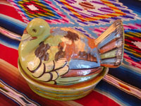 Mexican vintage pottery and ceramics and Mexican vintage folk-art, a lidded casserole in the form of a lovely green, nesting turkey, Tlaquepaque, c. 1940's. The green glaze and complimentary colors of the turkey's wings and feathers are very unique and wonderful. A side view of the Tlaquepaque turkey casserole.