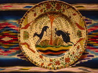 Mexican vintage pottery and ceramics, a magnificent Tlaquepaque plate with a starry-night background and decorated with leaping animals and birds, Tlaquepaque, Jalisco, c. 1920-30's. Attributed to the famous artist of that period, Balbino Lucano, or to his equally talented brother, Tomas Lucano. Main photo of Tlaquepaque pottery plate.