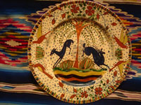 Mexican vintage pottery and ceramics, a magnificent Tlaquepaque plate with a starry-night background and decorated with leaping animals and birds, Tlaquepaque, Jalisco, c. 1920-30's. Attributed to the famous artist of that period, Balbino Lucano, or to his equally talented brother, Tomas Lucano. Another full-front view of the Tlaquepaque pottery plate attributed to Balbino Lucano or his brother Tomas.