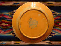 Mexican vintage pottery and ceramics, a magnificent Tlaquepaque plate with a starry-night background and decorated with leaping animals and birds, Tlaquepaque, Jalisco, c. 1920-30's. Attributed to the famous artist of that period, Balbino Lucano, or to his equally talented brother, Tomas Lucano. Photo of the back of the Tlaquepaque pottery plate.