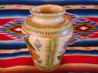 Mexican vintage pottery and ceramics, a beautiful pottery vase with lovely floral decorations, Tlaquepaque, Jalisco, c. 1930's. Another side of the Tlaquepaque or Tonala pottery vase.