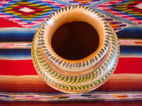 Mexican vintage pottery and ceramics, a beautiful pottery vase with lovely floral decorations, Tlaquepaque, Jalisco, c. 1930's. A photo of the top of the Tlaquepaque or Tonala pottery vase.