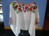 Mexican and Guatemalan vintage textiles and huipiles, a beautiful Guatemalan huipil with wonderful embroidered flowers, Coban, Guatemala, c. 1950.  Main photo of the huipil or blouse.