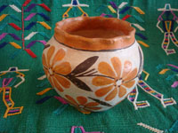 Native American Indian vintage pottery, a beautiful Acoma pot with wonderful floral decorations and a fluted rim, Acoma Pueblo, New Mexico, c. 1940's. Main photo of the Acoma pot.