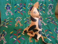 Mexican vintage folk art, and Mexican vintage woodcarvings and masks, a wonderful folk art woodcarving of a dog, sitting very attentively, by the great Manuel Jimenez of Oaxaca, c. 1950's. Another full photo of the dog by Manuel Jimenez of Oaxaca.