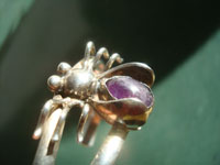 Native American Indian vintage sterling silver jewelry, and Navajo vintage sterling silver jewelry, a beautiful Navajo sterling silver bracelet, decorated with a wonderful spider with beautiful amethyst, Arizona or New Mexico, c. 1960's. A closeup side view of the spider.
