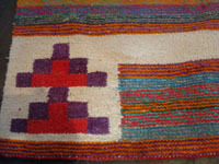 Native American Indian vintage textiles, and Navajo vintage textiles, rugs, and blankets, a beautiful Navajo woven-wool double saddle blanket, with beautiful colors and designs, Arizona or New Mexico, c. 1960's. Closeup photo of one corner of the Navajo blanket.