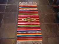 Mexican vintage textiles and Saltillo-style serapes (sarapes), a very fine Saltillo serape runner with beautiful color combinations and a wonderful silk center medallion, c. 1930's. Main photo of the Saltillo serape runner.
