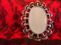 Mexican vintage tinwork art, a lovely tinwork art mirror with tin scalloping all around it, c. 1930's. Main photo of the mirror.