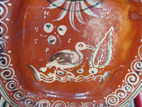 Mexican vintage pottery and ceramics, a beautiful banderaware rectangular dish with a wonderful glazed border surrounding the figure of a heron or egret, Tonala or San Pedro Tlaquepaque, c. 1930's.  Closeup photo of the heron or egret.