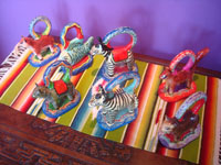 Mexican vintage folk art, a set of table-setting napkin holders, seven different animals and a wonderful fish, by the Castillo family of Izucar de Matamoros, c. 1960's. Main photo of the napkin holders.
