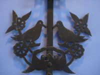 Mexican vintage devotional art, and Mexican vintage folk art, a wonderful wrought-iron cross, San Cristobal de las Casas, Chiapas, c. 1950. Closeup photo of the doves on either side of the cross.