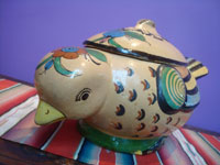 Mexican vintage pottery and ceramics, a very beautiful lidded pottery casserole dish in the shape of a lovely dove, Tonala or San Pedro Tlaquepaque, c. 1940's. Closeup photo of the front of the dish showing the dove's face.