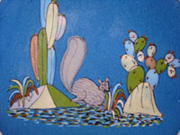 Mexican vintage pottery and ceramics, a lovely blue-ware plate from Tlaquepaque, Jalisco, c. 1940. The blue background glazing is very beautiful, and the rural scene on the plate is finely painted. It features a frolicking squirrel amidst plants and cacti. Closeup photo of the center design showing the wonderful squirrel and plants.