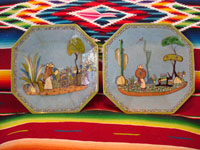 Mexican vintage pottery and ceramics, a pair of octagonal plates with a blue background and lovely rural scenes, Tlaquepaque, Jalisco, c. 1930's. The scenes show Mexican campesinos with their burros, amidst a beautiful rural landscape with plants and cacti. Main photo of the plates.
