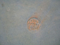 Mexican vintage pottery and ceramics, a pair of octagonal plates with a blue background and lovely rural scenes, Tlaquepaque, Jalisco, c. 1930's. The scenes show Mexican campesinos with their burros, amidst a beautiful rural landscape with plants and cacti. Photo of the bottom of one plate with the stamp of the Arias shop in Tlaquepaque, Jalisco.