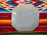 Mexican vintage pottery and ceramics, a pair of octagonal plates with a blue background and lovely rural scenes, Tlaquepaque, Jalisco, c. 1930's. The scenes show Mexican campesinos with their burros, amidst a beautiful rural landscape with plants and cacti. A photo of the back of one of the plates.