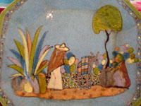 Mexican vintage pottery and ceramics, a pair of octagonal plates with a blue background and lovely rural scenes, Tlaquepaque, Jalisco, c. 1930's. The scenes show Mexican campesinos with their burros, amidst a beautiful rural landscape with plants and cacti. A closeup of the rural scene on the first plate.