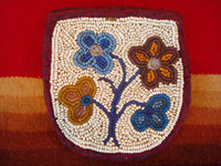 Native American Indian beadwork, a beautiful beaded pouch on native-tanned hide, Woodlands Indian, c. 1910-20. The beads are very fine, and the beadwork is exceptional! Main photo.