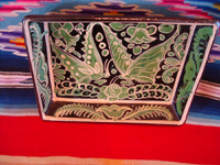 Mexican vintage pottery and ceramics, a fantasia rectangular baking dish with wonderful butterflies, Tonala or Tlaquepaque, Jalisco, c. 1930's.  Closeup photo of the front of the dish.