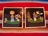 Mexican vintage pottery and ceramics, a pair of lovely black-ware tiles from Tlaquepaque, Jalisco, c. 1920-30. The artwork on these tiles is extremely fine and crisp, and the scenes of rural life in Mexico of that period are wonderful! Main photo of the pair.