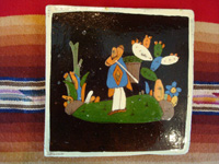 Mexican vintage pottery and ceramics, a pair of lovely black-ware tiles from Tlaquepaque, Jalisco, c. 1920-30. The artwork on these tiles is extremely fine and crisp, and the scenes of rural life in Mexico of that period are wonderful! Closeup photo of one of the tiles.
