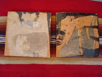 Mexican vintage pottery and ceramics, a pair of lovely black-ware tiles from Tlaquepaque, Jalisco, c. 1920-30. The artwork on these tiles is extremely fine and crisp, and the scenes of rural life in Mexico of that period are wonderful! Photo of the back sides of the two tiles.