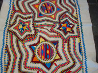 Guatemalan vintage textiles, runners, and huipiles, a two-sided embroidered runner with lovely star-designs, San Juan Zacatepecquez, c. 1950. Closeup photo of the embroidery on the second side.