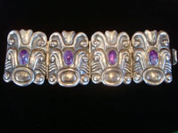 Mexican vintage sterling silver jewelry, and Taxco vintage silver jewelry, a beautiful sterling silver repousse bracelet with amethyst, Taxco, c. 1940's.  Main photo of the Taxco silver bracelet.