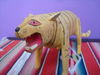 Mexican vintage folk art, and Mexican vintage woodcarvings and masks, a wonderful woodcarving of a fierce tiger, attributed to the great Manuel Jimenez of Oaxace, c. 1950's. Closeup photo showing the tiger's mouth and teeth.