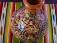 Mexican vintage pottery and ceramics, a very beautiful pottery water jar with a wonderful geometric Aztec design, Tonala or San Pedro Tlaquepaque, c. 1940.  Photo shot from above the bottle, looking down at the mouth.