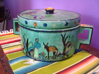 Mexican vintage pottery and ceramics, a beautiful Tlaquepaque pottery tortilla warmer with a lid, Tonala or San Pedro Tlaquepaque, Jalisco, c. 1930's.  Another side view of the piece showing a Mexican and his burro.