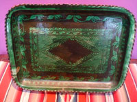 Mexican vintage pottery and ceramics, a wonderful pottery tray with fine decorations resembling a fine tapestry in the center, flanked on either side with floral designs, Patanbam, Michoacan, c. 1950's.  Main photo of the front of the dish.