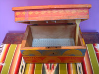 Guatemalan folk art and woodcarvings, a beautiful wooden "keep-sake" box with wonderul geometrical decorations, Guatemala, c. 1950. Photo of the box with the lid open, showing the inside of the box.