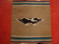 New Mexican vintage textiles, a lovely Chimayo textile with a very tight weave and beautiful wool, Chimayo, New Mexico, c. 1940's. Closeup phot of he center medallion.