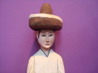 Mexican vintage folk art and woodcarving, a wonderful woodcarving of a Mexican paisano by the master carver Manuel Jimenez of Oaxaca, c. 1950's.  Closeup photo of the man's face.