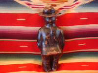 Mexican vintage pottery and ceramics and Mexican vintage folk art, a clay figure of Mexican artist Diego Rivera, Barrio de Luz, c. 1940. Diego was married to the also famous artist, Frida Kahlo. This pottery piece is very well done and is a wonderful piece of Mexican folk art. Photo of back of figure.
