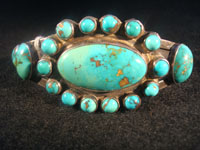 Native American Indian vintage silver jewelry, a Navajo sterling silver bracelet with wonderful natural turquoise stones, c. 1920; ingot silver. The turquoise is about the most beautiful you will ever see!  Main photo.