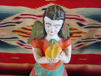 Mexican vintage pottery and ceramics, and Mexican vintage folk art, a candle-holder in the form of an angel, attributed to the famous folk artist Heron Martinez Mendoza, Acatlan, Puebla, c. 1970. Closeup of angel's face.