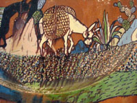 Mexican vintage pottery and ceramics, an incredibly large charger with an intricately painted scene of a campesino returning home with his burro, Tlaquepaque, Jalisco, c. 1920's. Closeup of the burro.
