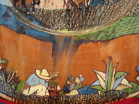 Mexican vintage pottery and ceramics, an incredibly large charger with an intricately painted scene of a campesino returning home with his burro, Tlaquepaque, Jalisco, c. 1920's. Photo of snoozing man at base of charger.