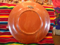 Mexican vintage pottery and ceramics, an incredibly large charger with an intricately painted scene of a campesino returning home with his burro, Tlaquepaque, Jalisco, c. 1920's. Photo of the back side of the charger.